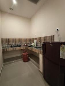 Kuchyň nebo kuchyňský kout v ubytování Quality Inn Varkala