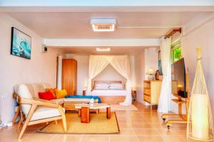 TV a/nebo společenská místnost v ubytování Blue Whale Villa - Deluxe