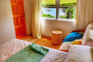 Postel nebo postele na pokoji v ubytování Blue Whale Villa - Deluxe