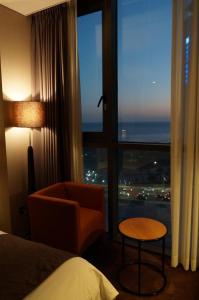 Postel nebo postele na pokoji v ubytování Best Louis Hamilton Hotel Haeundae