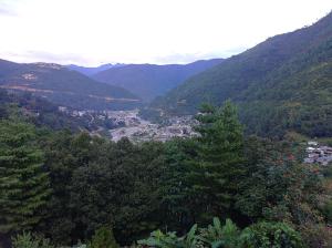 a view of a valley in the mountains at Pema HOMESTAY in Dirang Dzong