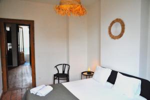Postel nebo postele na pokoji v ubytování Boho Apartments - 2 Bedrooms