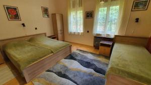 Posteľ alebo postele v izbe v ubytovaní Apartment Balatonföldvar - Balaton 18521