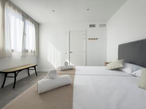 Postel nebo postele na pokoji v ubytování Apartamentos Clotilde