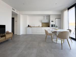 Kuchyň nebo kuchyňský kout v ubytování Apartamentos Clotilde
