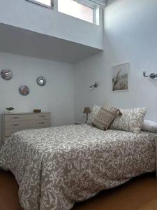Katil atau katil-katil dalam bilik di Apartamento junto a la playa