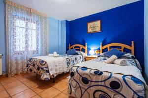 Postel nebo postele na pokoji v ubytování Casa Lino