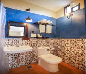 O baie la Heritage by DeFleur +34 fotografii