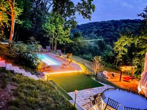 an image of a swimming pool in a backyard at Šumska Vila Lipovica in Barajevo