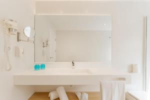 Koupelna v ubytování R2 Buganvilla Hotel & Spa
