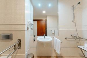a bathroom with a sink and a shower at R2 Rio Calma in Costa Calma