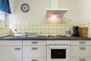 Kuchyň nebo kuchyňský kout v ubytování Haus Rebberg
