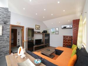 a living room with a couch and a table at Apartment Tonka - Two Bedroom Apartment - ST in Supetar