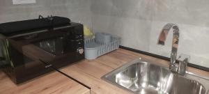 Kuchyň nebo kuchyňský kout v ubytování OpenView Apartment