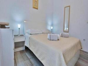 Postel nebo postele na pokoji v ubytování Apartments Lenka - One Bedroom Apartment with Balcony and Center View A3