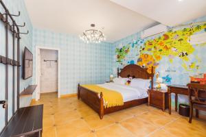 Postel nebo postele na pokoji v ubytování Hanju Guesthouse - Near Disney Park