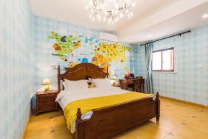Postel nebo postele na pokoji v ubytování Hanju Guesthouse - Near Disney Park