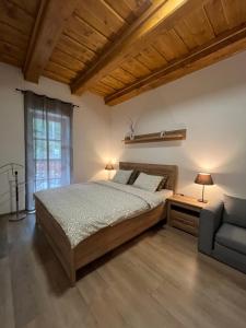 Voodi või voodid majutusasutuse Apartmány La Šiška toas