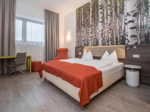 Posteľ alebo postele v izbe v ubytovaní Eco Suite Hotel