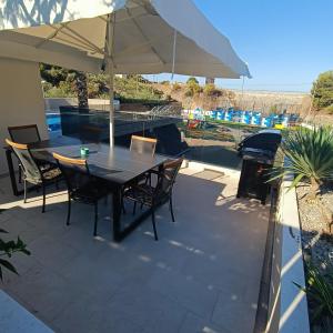 Patio nebo venkovní prostory v ubytování Primošten Pool Fantasy apartmant + 17 fotografií
