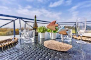 Nápoje v ubytování Bel appartement exposé Sud-ouest avec terrasse