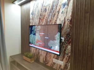 A television and/or entertainment centre at Florenza khamsin aprt F7