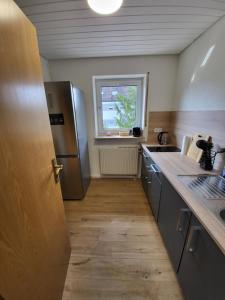 Η κουζίνα ή μικρή κουζίνα στο Schöne 2 Zimmerwohnung in Crailsheim