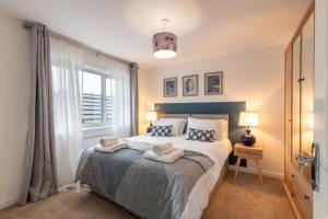 Ένα ή περισσότερα κρεβάτια σε δωμάτιο στο Prime location 3 bed House
