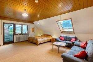 Postel nebo postele na pokoji v ubytování Gästehaus Retsch