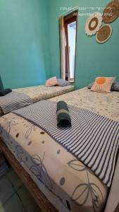 The Backyard Hostel客房内的一张或多张床位