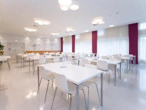 Reštaurácia alebo iné gastronomické zariadenie v ubytovaní Eco Suite Hotel