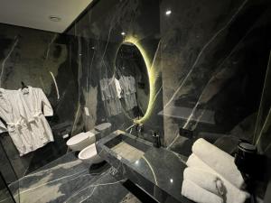 Koupelna v ubytování Arka Art Hotel