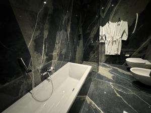 Koupelna v ubytování Arka Art Hotel