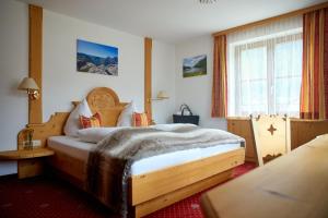 Postel nebo postele na pokoji v ubytování Montafon Moments + 37 fotografií