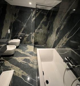 Koupelna v ubytování Arka Art Hotel
