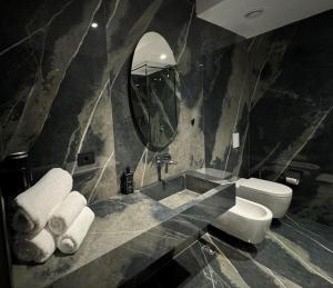 Koupelna v ubytování Arka Art Hotel