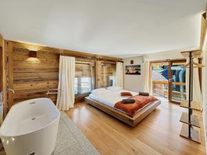 Postel nebo postele na pokoji v ubytování Pilanous House - Penthouse suite - Swiss Alps