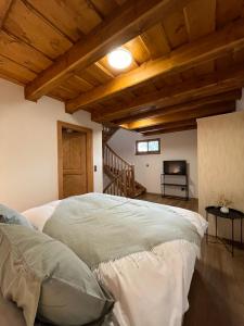 Postel nebo postele na pokoji v ubytování Apartmány La Šiška