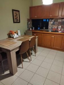 Kuchyň nebo kuchyňský kout v ubytování Virginia Apartment