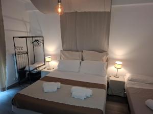 Postel nebo postele na pokoji v ubytování Airport Bari palese DELUXE 28