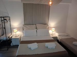 Postel nebo postele na pokoji v ubytování Airport Bari palese DELUXE 28