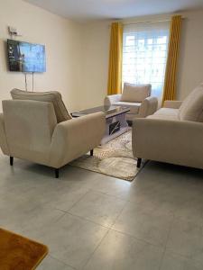 Ruang duduk di Olive Homes Modern & Stylish Suite - 2 bdrm