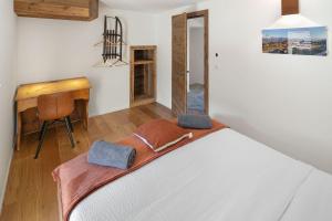 Postel nebo postele na pokoji v ubytování Pilanous House - Penthouse suite - Swiss Alps
