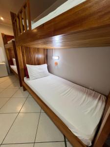 Postel nebo postele na pokoji v ubytování Hostel Da Jô