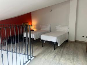 Posteľ alebo postele v izbe v ubytovaní Heart Centre Milan Navigli 3 Levels Apartment