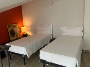 Posteľ alebo postele v izbe v ubytovaní Heart Centre Milan Navigli 3 Levels Apartment