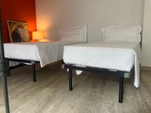 Posteľ alebo postele v izbe v ubytovaní Heart Centre Milan Navigli 3 Levels Apartment