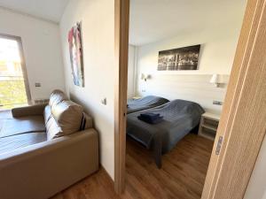 Postel nebo postele na pokoji v ubytování Apartsalou Michelangelo + 30 fotografií