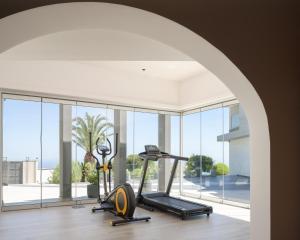 The fitness centre and/or fitness facilities at Villa Kalliston