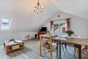 TV a/nebo společenská místnost v ubytování Haus Rebberg